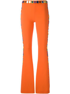 расклешенные декорированные брюки Moschino