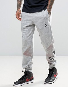 Джоггеры с крупным логотипом Nike Jordan 833920-063 - Серый