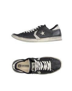 Низкие кеды и кроссовки Converse Limited Edition