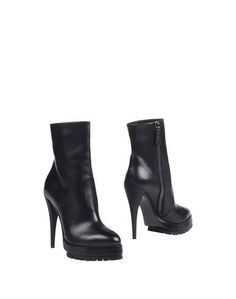 Полусапоги и высокие ботинки Casadei
