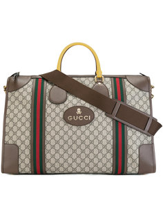 signature logo print holdall Gucci