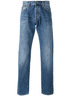 джинсы с потертостями Carhartt