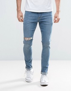 Синие выбеленные джинсы скинни с прорехами ASOS - Синий