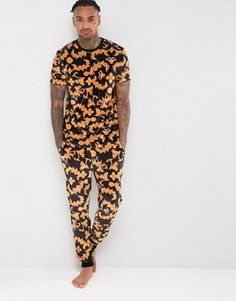 Велюровые супероблегающие джоггеры с барочным принтом ASOS - Черный