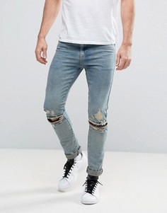 Выбеленные супероблегающие джинсы с рваной отделкой и молниями на коленях ASOS - Синий