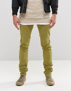 Светло-зеленые супероблегающие джинсы ASOS - Зеленый