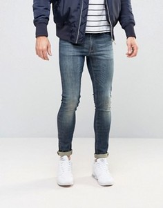Темно-синие суперзауженные джинсы ASOS - Синий