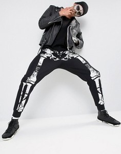 Джоггеры с принтом скелета ASOS Halloween - Черный