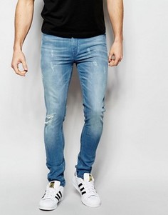 Супероблегающие джинсы с потертостями ASOS - Синий
