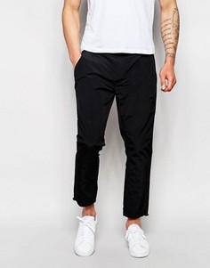 Черные суженные книзу брюки из нейлона ASOS - Черный