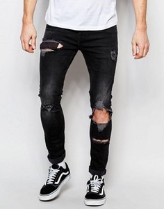 Супероблегающие джинсы с большими дырками ASOS - Черный