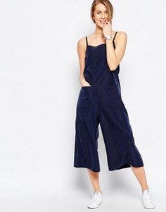 Комбинезон на бретельках с юбкой‑шортами и карманами ASOS - Синий