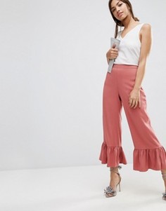 Брюки с рюшами по низу ASOS - Розовый