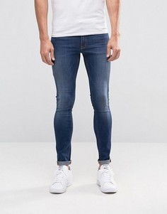 Темные супероблегающие джинсы ASOS - Синий
