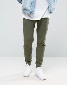 Суперзауженные джоггеры цвета хаки ASOS - Зеленый