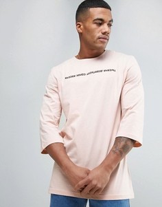 Розовая футболка с рукавами 3/4 и надписью на русском языке Puma 57443402 - Розовый