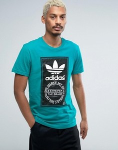 Футболка с камуфляжным принтом лейбла adidas Originals - Синий
