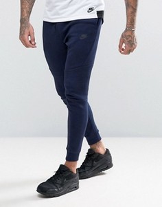 Синие флисовые джоггеры суженного книзу кроя Nike Tech 836416-408 - Синий