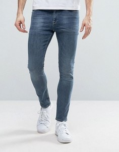 Синие выбеленные укороченные джинсы супероблегающего кроя ASOS - Синий
