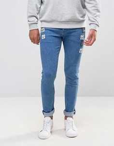Ярко-синие супероблегающие джинсы с нашивками ASOS - Синий