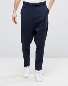 Темно-синие брюки с заниженным шаговым швом ASOS - Темно-синий