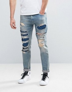 Выбеленные зауженные джинсы с рваной отделкой ASOS - Синий