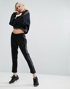 Черные брюки-сигареты с полупрозрачными вставками по бокам adidas Paris - Черный
