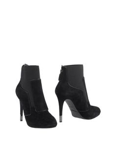 Полусапоги и высокие ботинки Guess