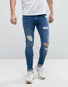Супероблегающие джинсы с прорехами ASOS - Синий