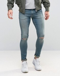 Супероблегающие джинсы с дырками на коленях ASOS - Синий
