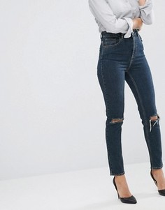 Темно-выбеленные джинсы узкого кроя в винтажном стиле с рваными коленями ASOS FARLEIGH - Синий