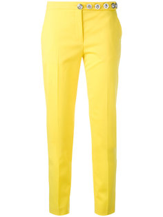 slim-fit trousers Versus