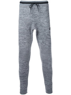 tech knit track pants Nike