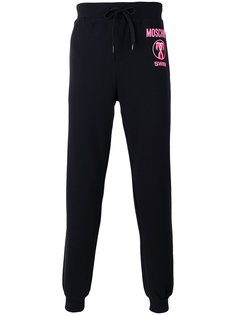 flamingo print track pants Moschino