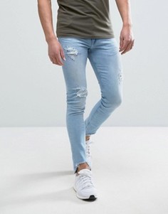 Выбеленные рваные супероблегающие джинсы ASOS - Синий