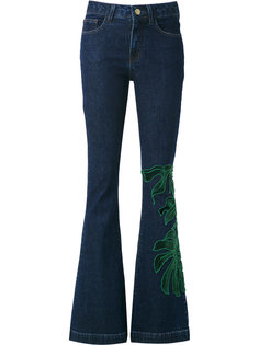 patch flared jeans Martha Medeiros