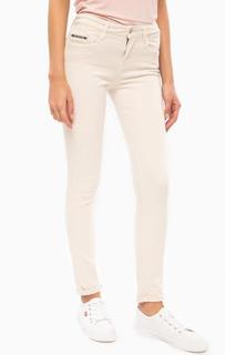 Однотонные зауженные брюки из денима Calvin Klein Jeans