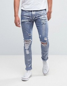 Супероблегающие рваные джинсы с покрытием металлик ASOS - Синий