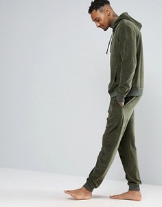 Велюровые джоггеры скинни ASOS - Зеленый