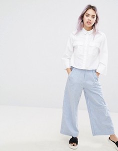 Брюки в полоску Monki - Синий