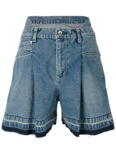 джинсовые расклешенные шорты  Sacai