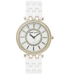 Часы округлой формы с белым браслетом Anne Klein
