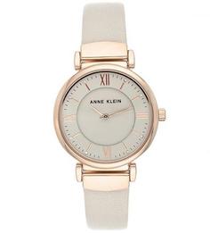 Часы круглой формы с кожаным ремешком Anne Klein