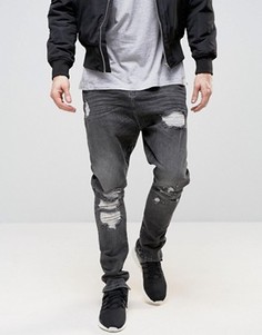 Черные выбеленные джинсы с рваной отделкой и заниженным шаговым швом ASOS - Черный
