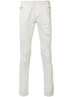 узкие джинсы с протертыми деталями Balmain