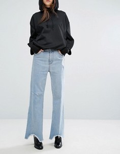 Расклешенные джинсы с завышенной талией и неровным краем Cheap Monday - Синий