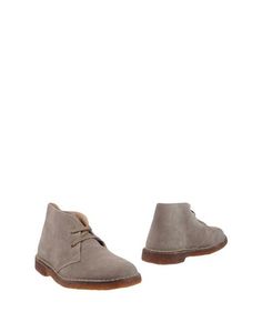 Полусапоги и высокие ботинки Cuoieria