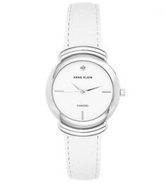 Часы круглой формы с белым кожаным браслетом Anne Klein