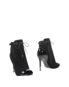 Полусапоги и высокие ботинки Guess