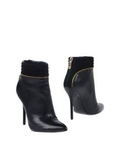 Полусапоги и высокие ботинки Guess